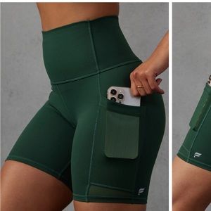 Fabletics power hold bike shorts, turquoise green color, size medium